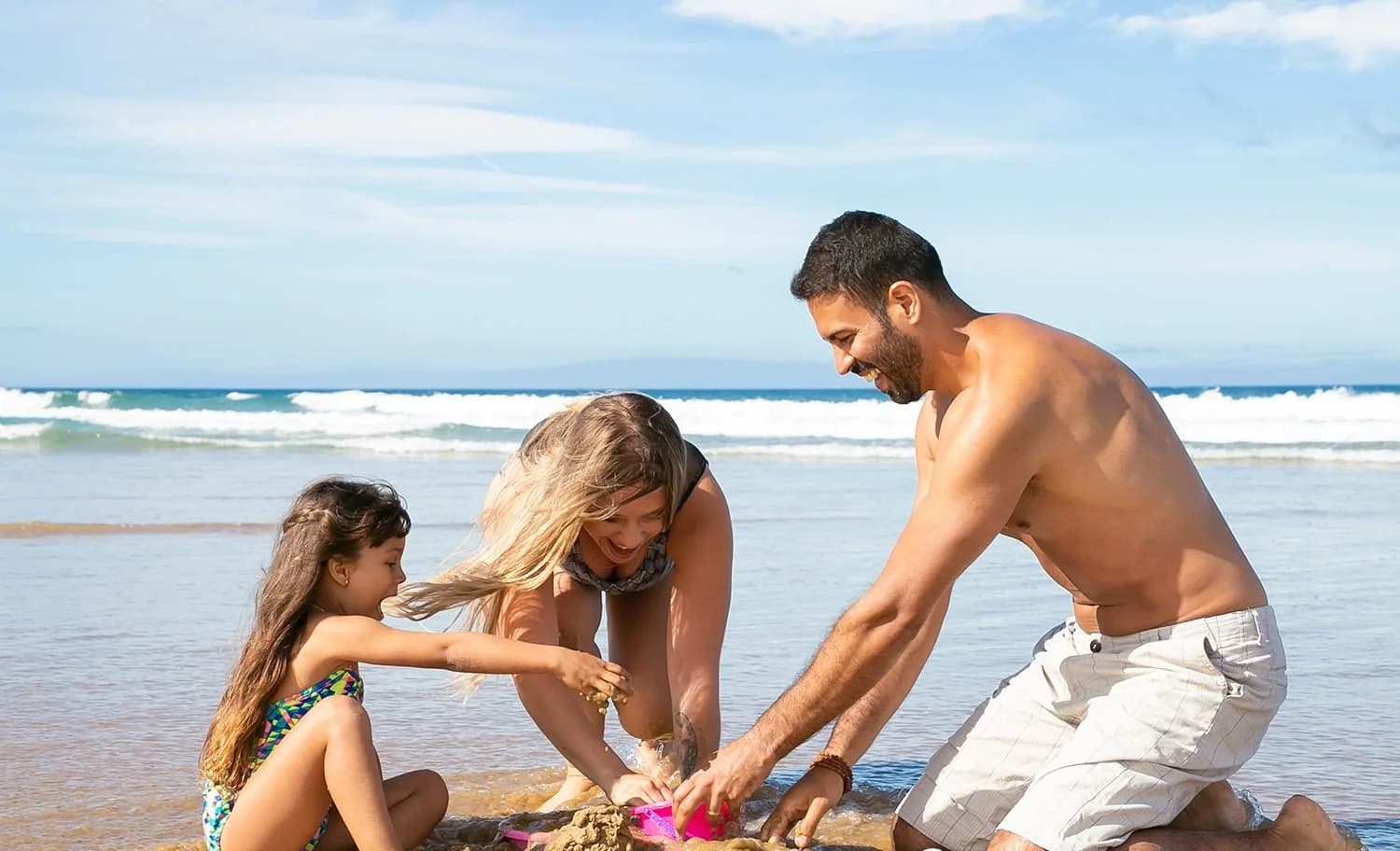 Familia disfrutando la playa en Yucatán